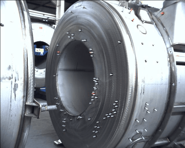 MRI machine face showing the studs inspected by the computer vision system